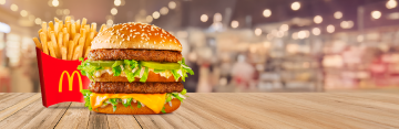 Hamburguesa BigMac + papas medianas a S/14.90